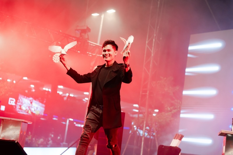 Zach NG performing dove magic at Sutera Together 2025